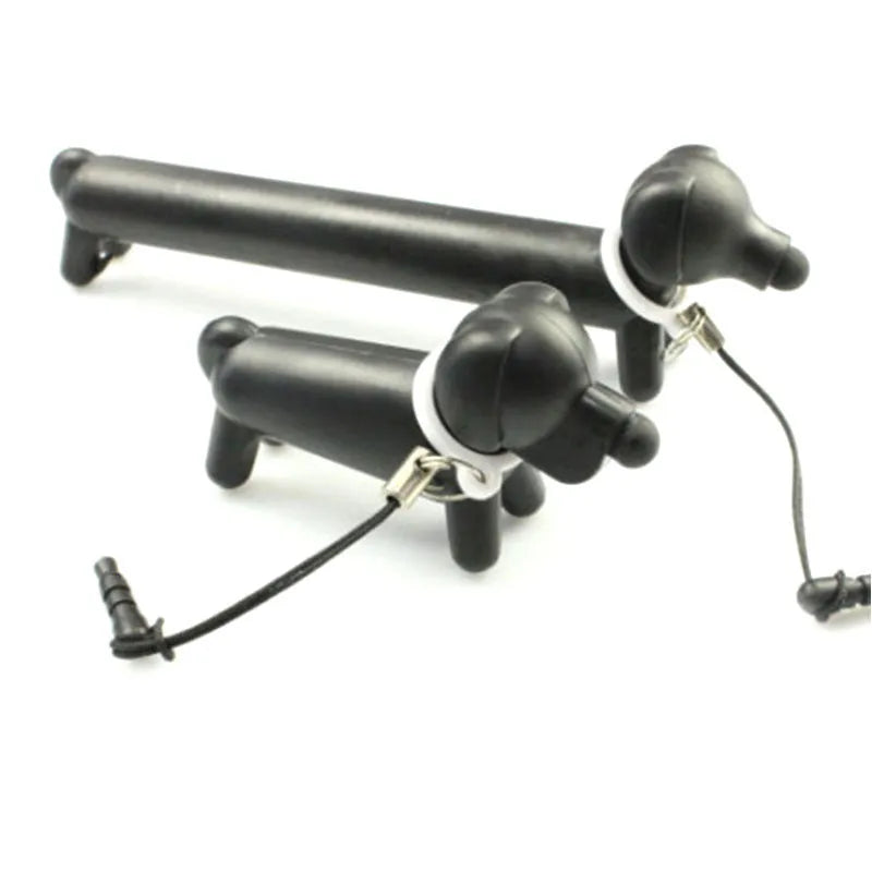 Black dog-shaped touch screen stylus with conductive construction shown next to its carry pouch