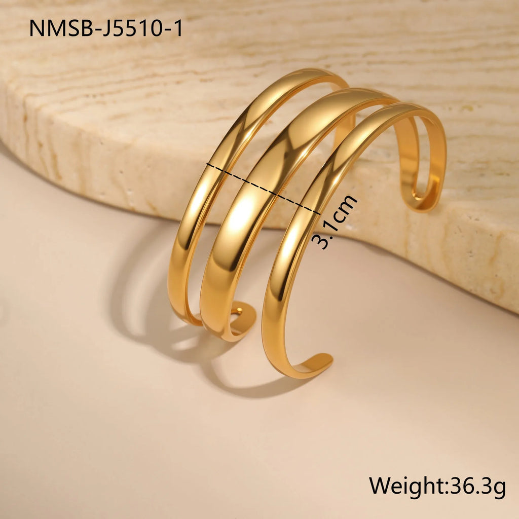 Stainless steel women's bracelet with geometric design and 18K gold electroplating in gold and steel colour options