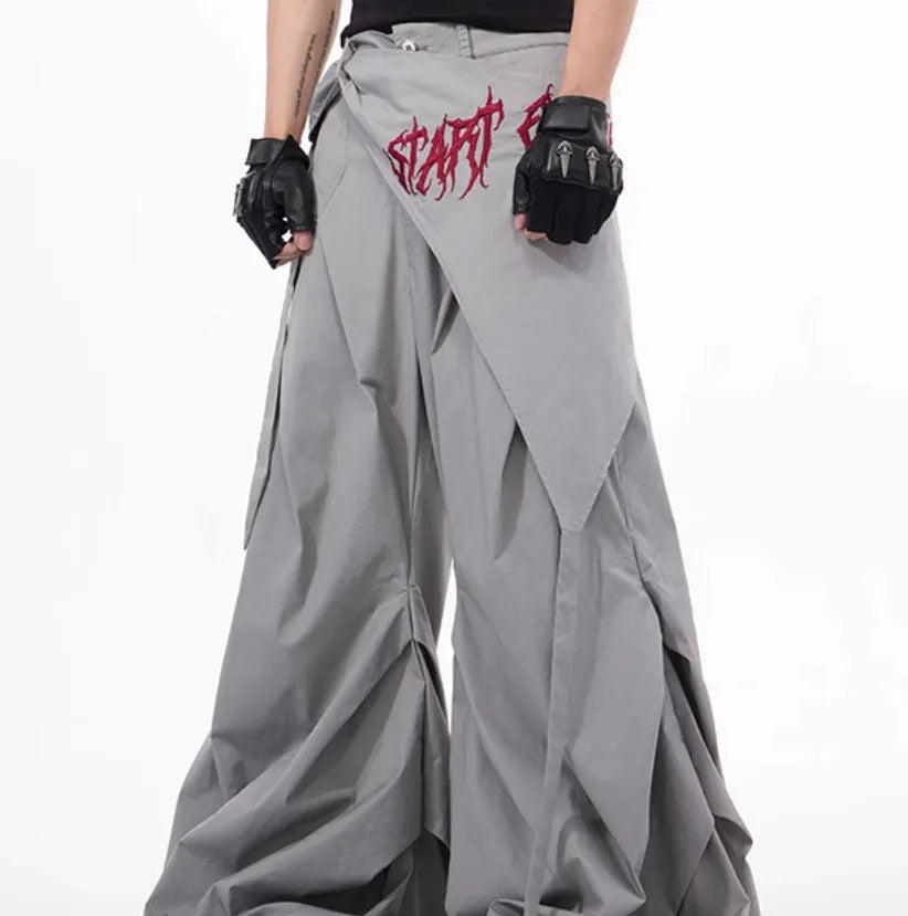 Korean style wide-leg summer pants for boys in black and grey solid colours.