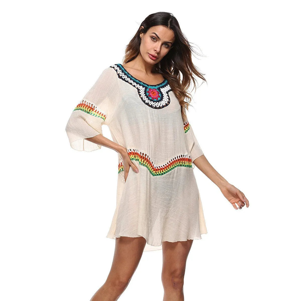 Crocheted ethnic style sun protection beach cover-up for women in apricot colour.