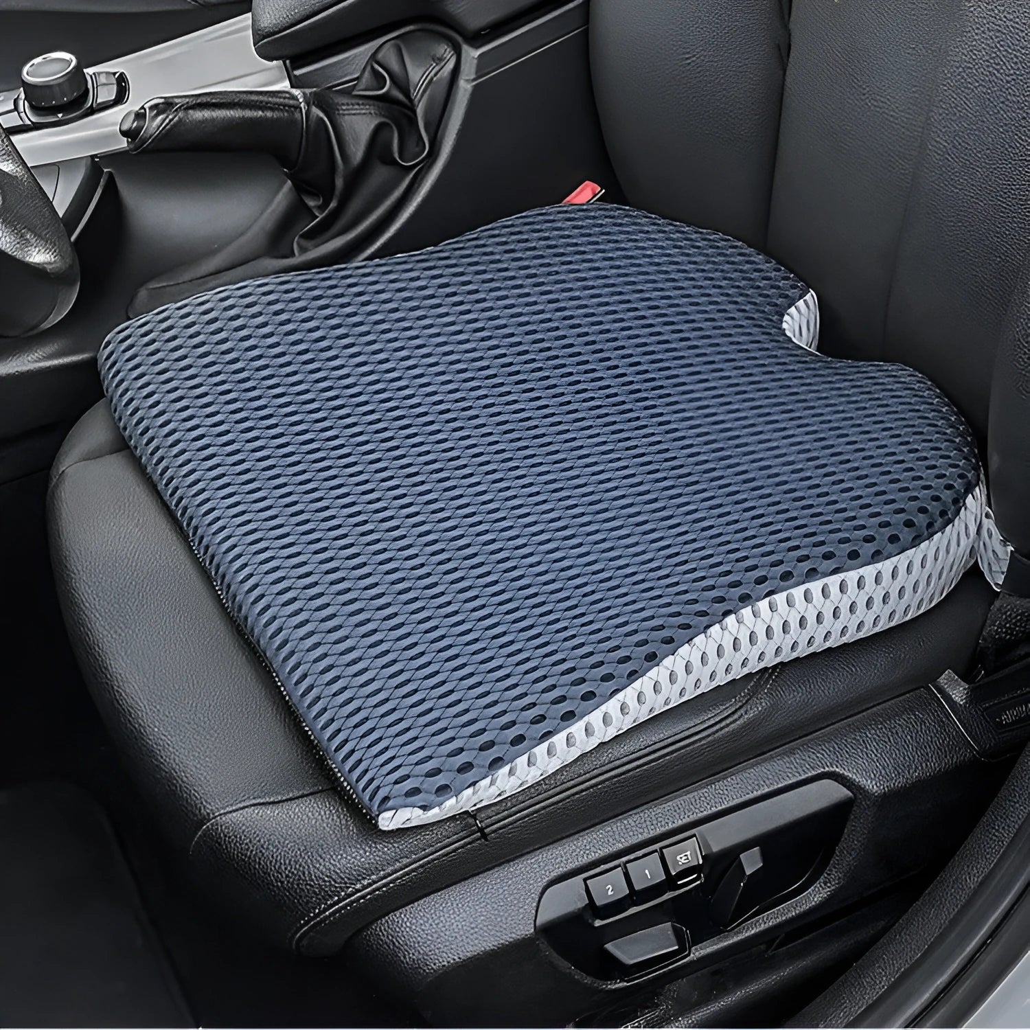 Memory foam car cushion with fixed straps in black colour on office chair