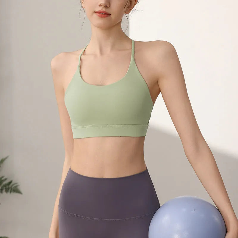 Women's sports vest in nylon with fixed double-shoulder straps for running and workouts.