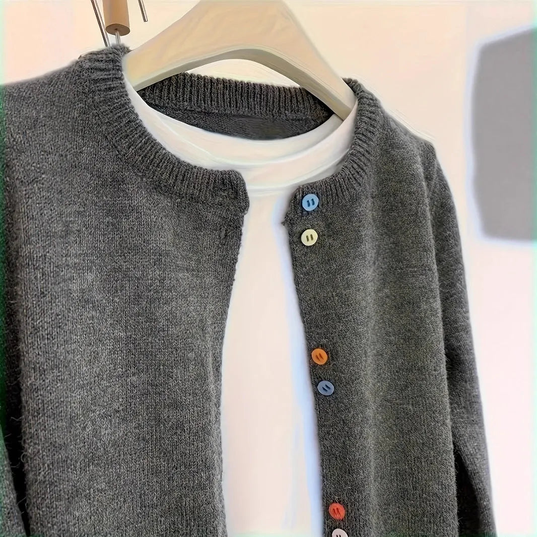 Dark grey women's cardigan sweater with button front and long sleeves