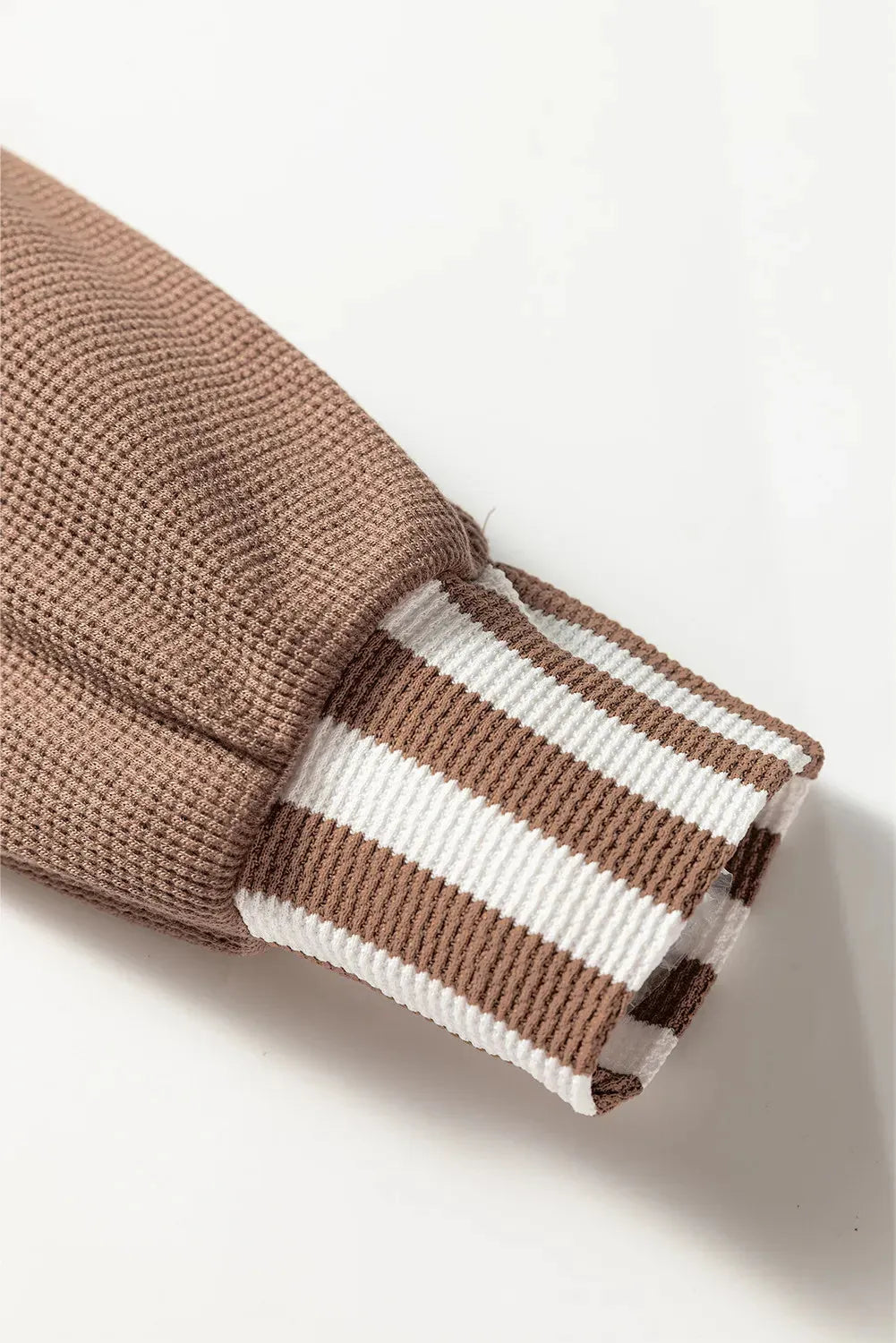 Straw yellow waffle texture hoodie with striped patchwork design and button neck