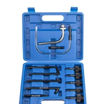 13-piece automatic transmission oil refuelling kit with hand pump and assorted connectors on a white background.