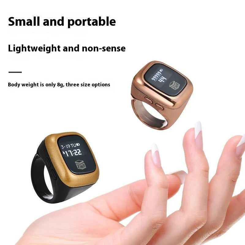 Electronic dhikr counter on wrist showing digital display, available in black, space gray, rose gold, silver, wine red, or green.