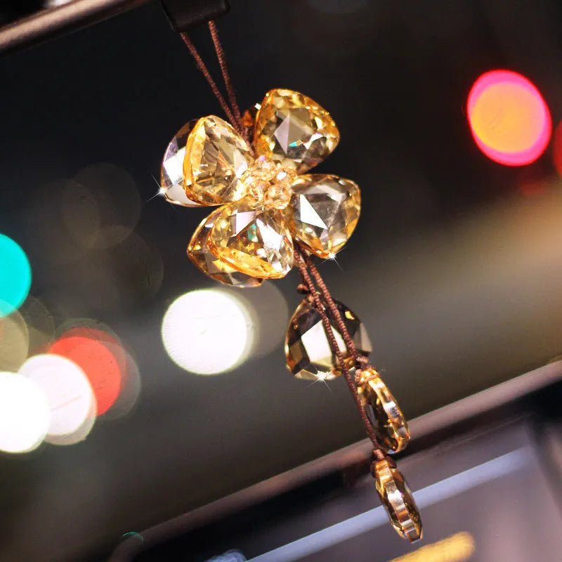 Crystal four leaf grass car pendant in four colour options hanging from rearview mirror