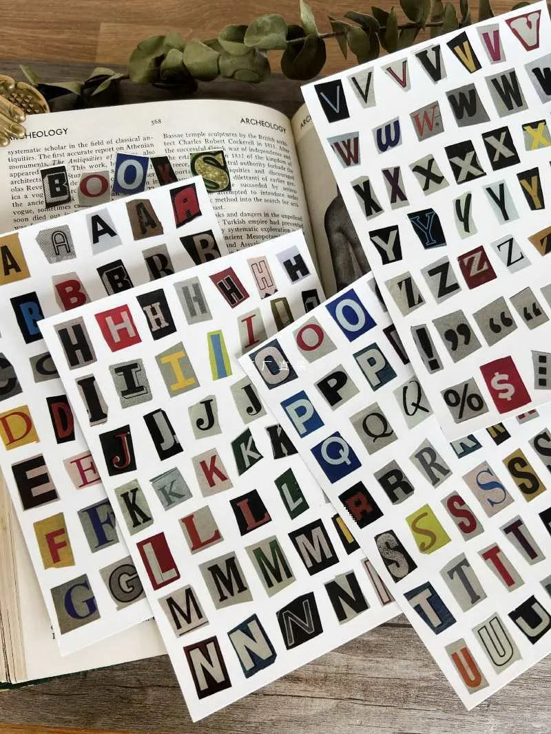 Set of cute style printed stickers featuring English letters, numbers, symbols, and weekday words for decoration and labelling.