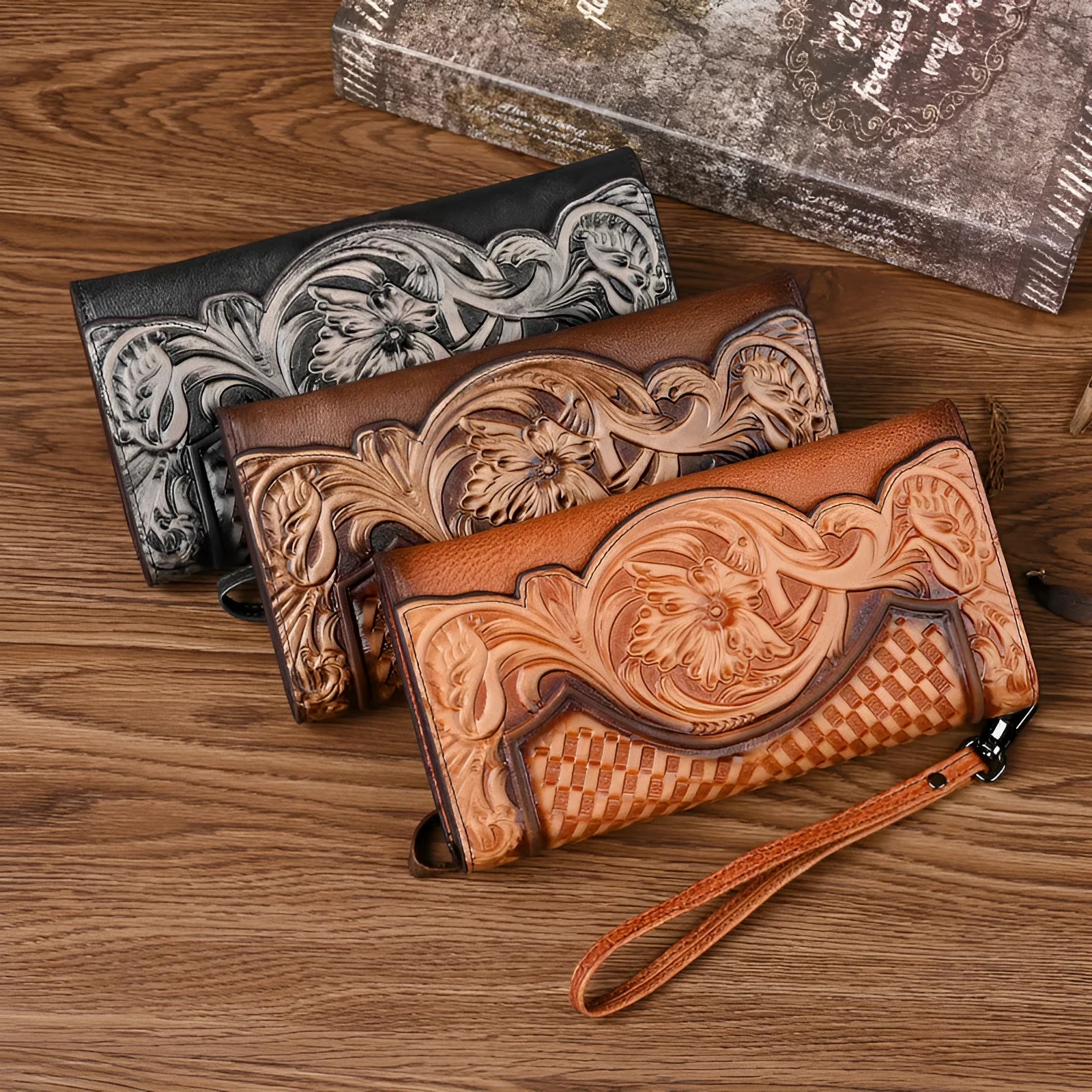 Women's brown tri-fold leather wallet with embossed floral pattern, shown open to reveal compartments.