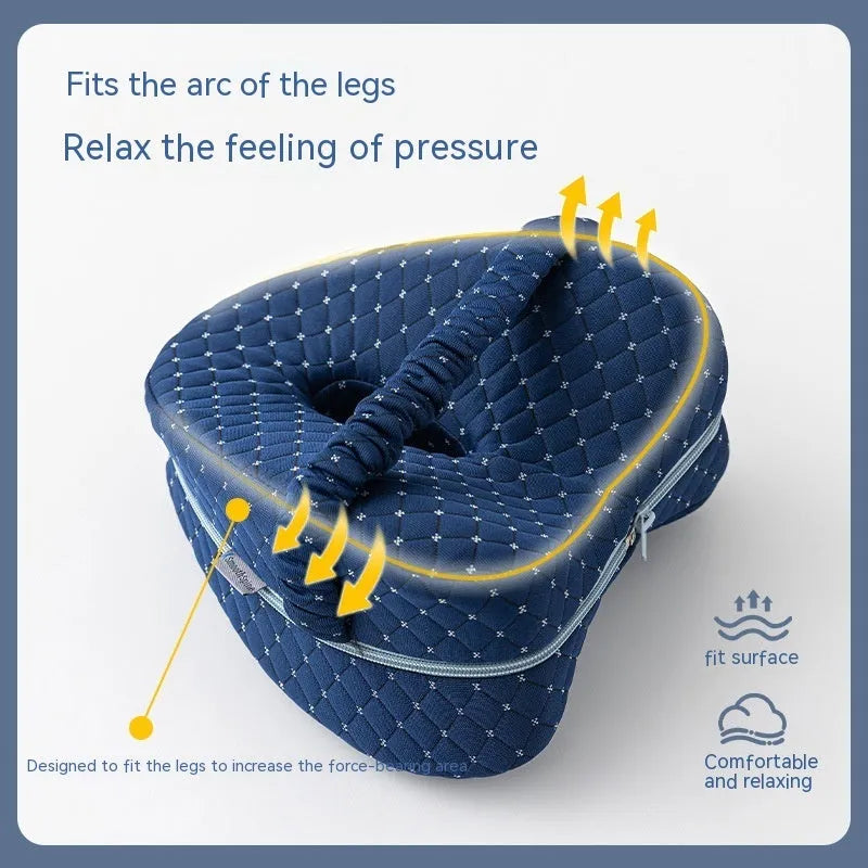 Love heart-shaped memory foam leg pillow in dark blue jacquard colour measuring 25x23x13cm