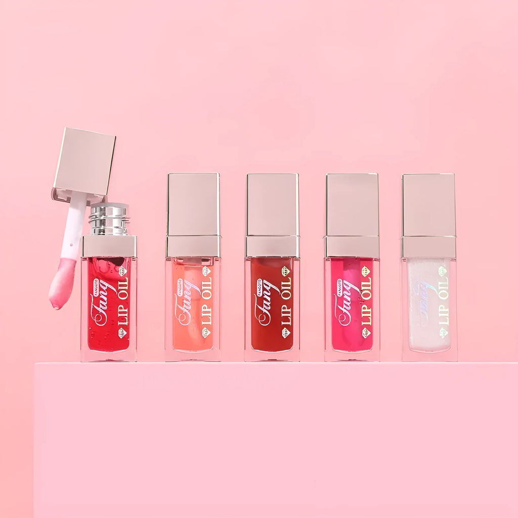 Mint lipstick set with five colour shades and a lip essence oil bottle.