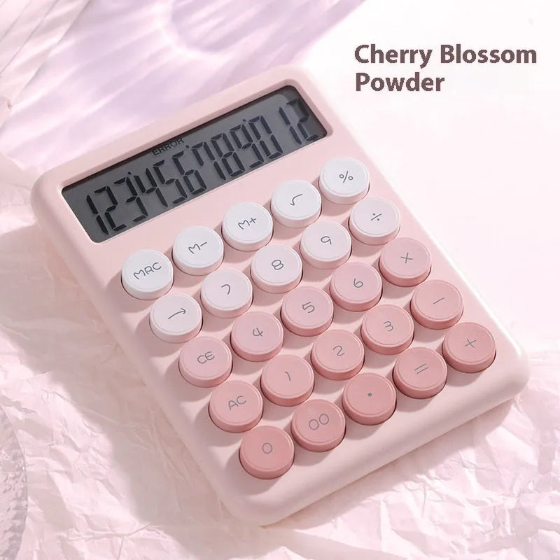 Desktop calculator with gradient colour options including violet, pink, blue and mint green