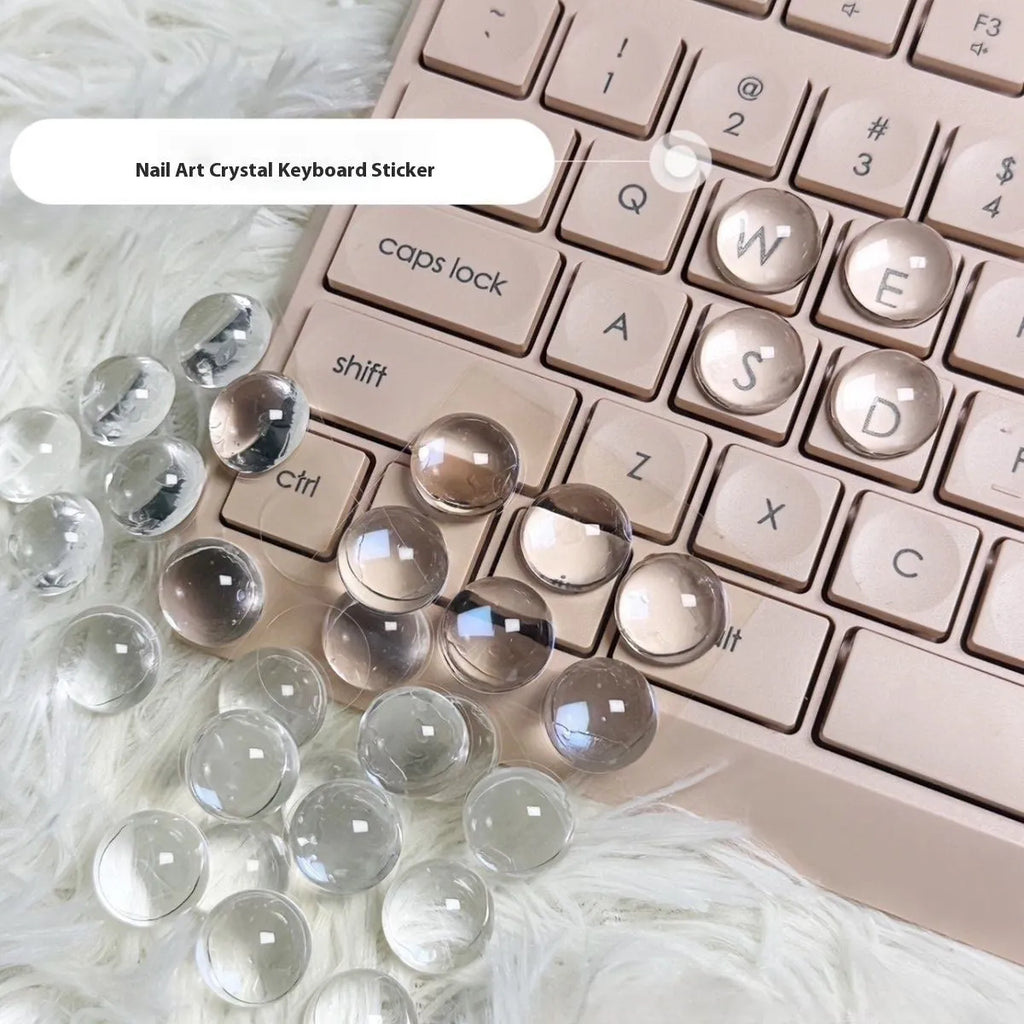 Set of PVC crystal glass ball keyboard stickers in 12x6mm size on a keyboard showing raised transparent domes