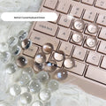 Set of PVC crystal glass ball keyboard stickers in 12x6mm size on a keyboard showing raised transparent domes