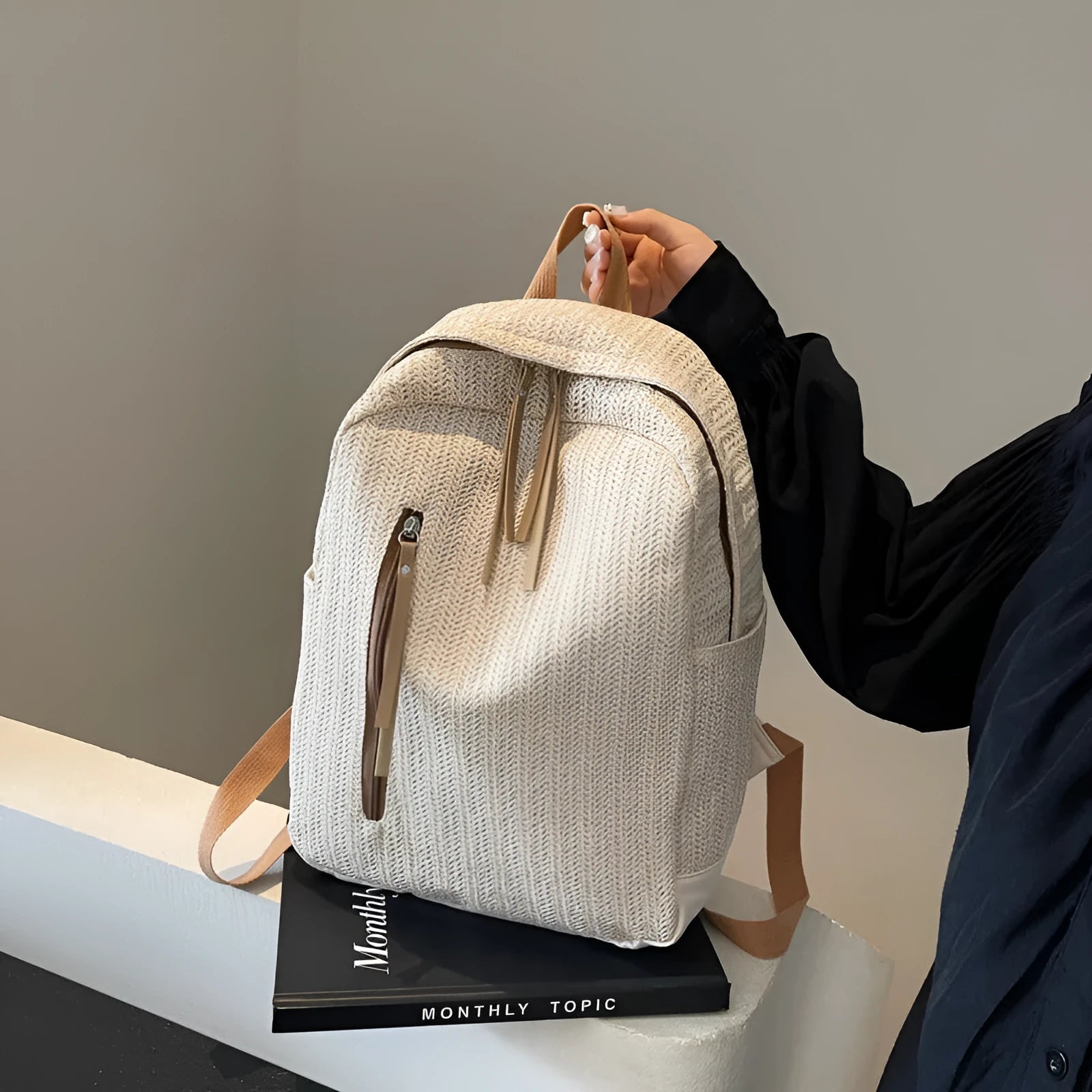 Minimalist waterproof polyester backpack for women in urban simplicity style with phone pocket