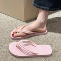 Women's casual PVC flip flops with toe covering style and injection moulded non-slip sole in multiple colour options.