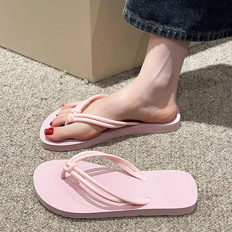 Women's casual PVC flip flops with toe covering style and injection moulded non-slip sole in multiple colour options.