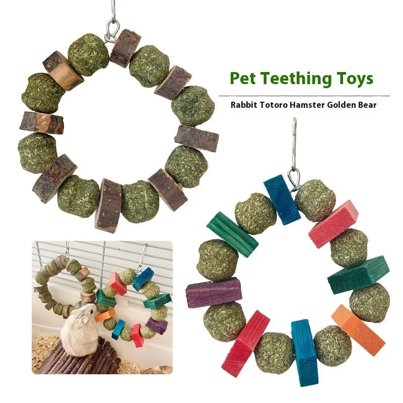 Hamster chew toy with Applewood stick and woven straw ball ring on a white background.