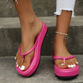 A pair of thick-soled flip-flops with a herringbone-patterned strap in one of six available colours.