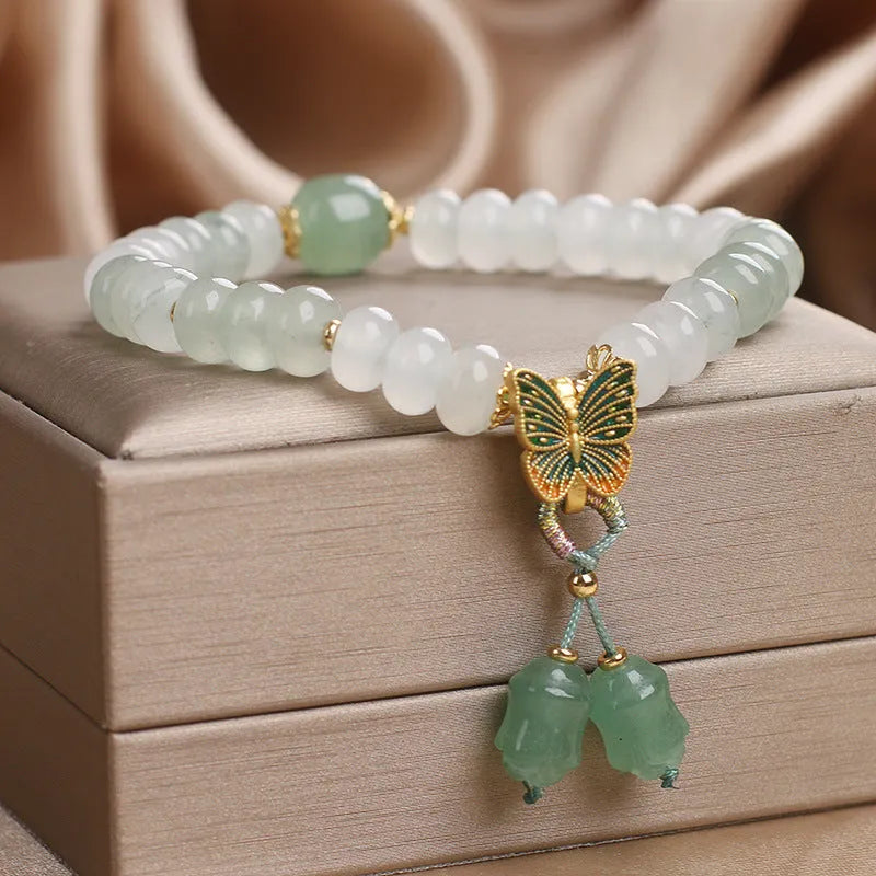 Green crystal women's bracelet with retro butterfly tassel and abacus beads