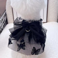 Black tulle princess skirt costume on a small dog, showing the gauze material and fit.