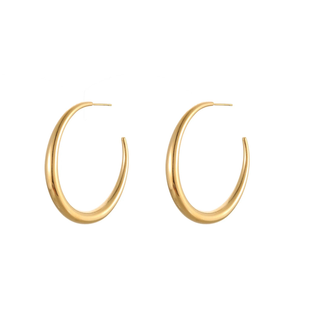A pair of simple round titanium steel hoop earrings for women, shown in gold and steel finishes.