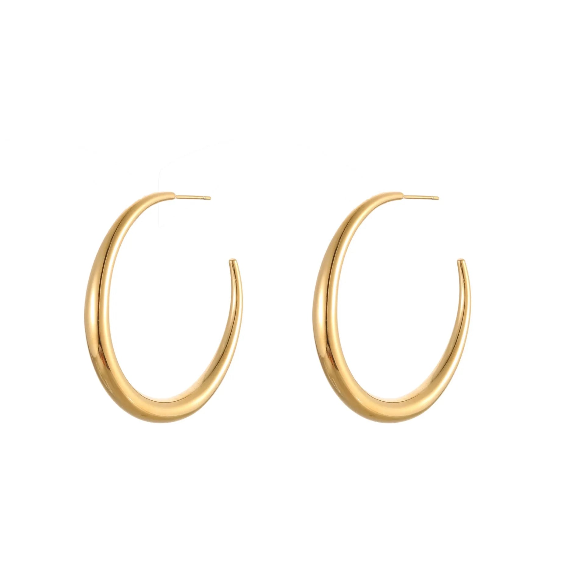 A pair of simple round titanium steel hoop earrings for women, shown in gold and steel finishes.