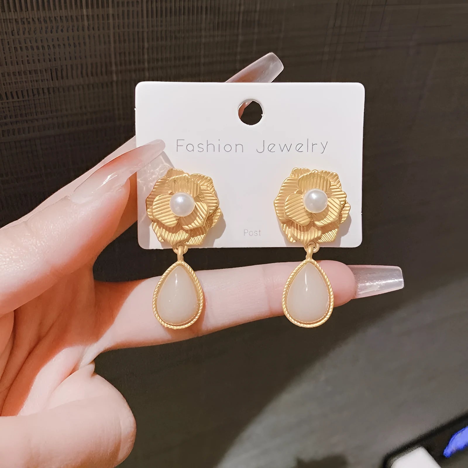 Gold coloured flower stud earrings with opal stone and ice flower design on silver electroplated alloy