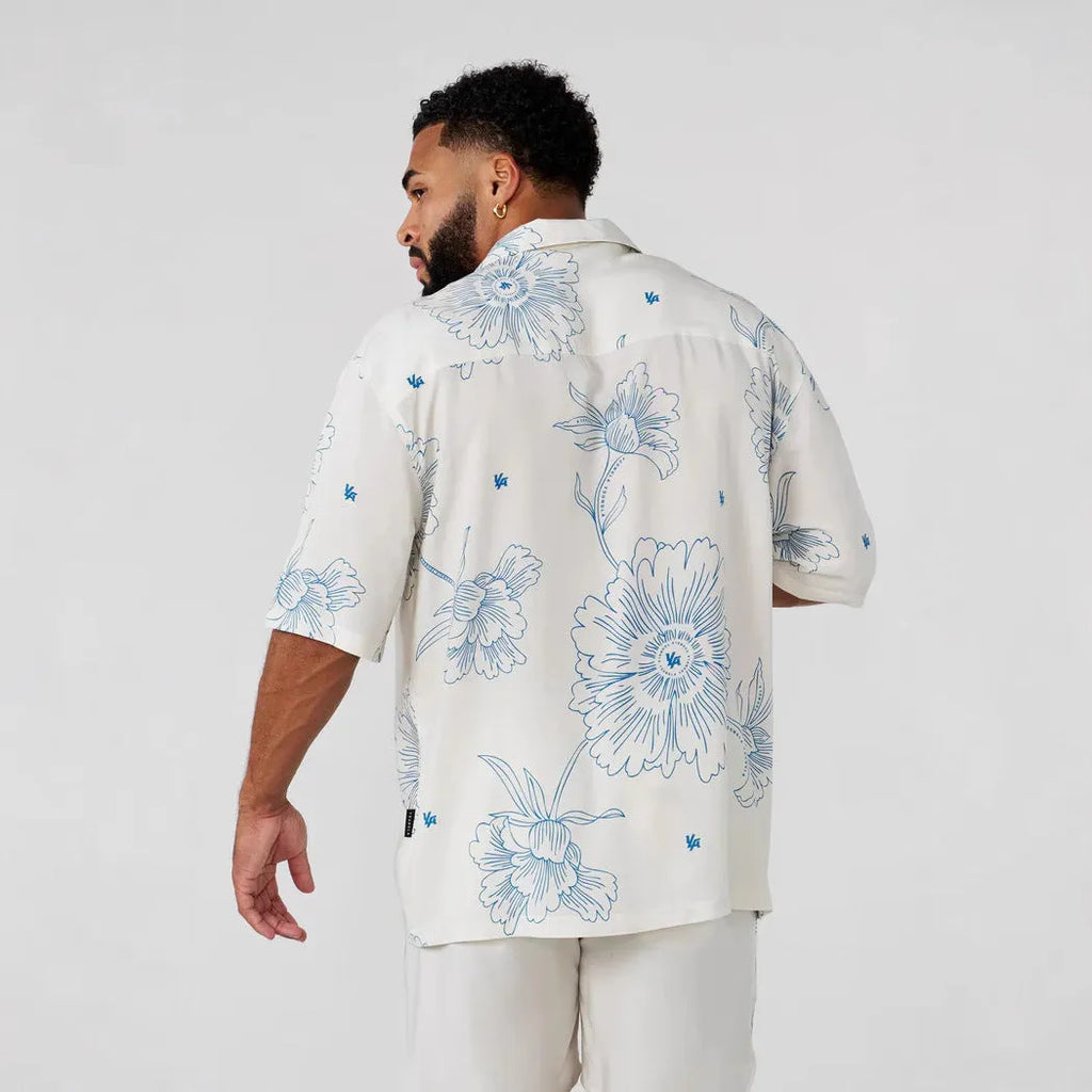 Men's printed casual short sleeve shirt with floral pattern in loose fit polyester fabric