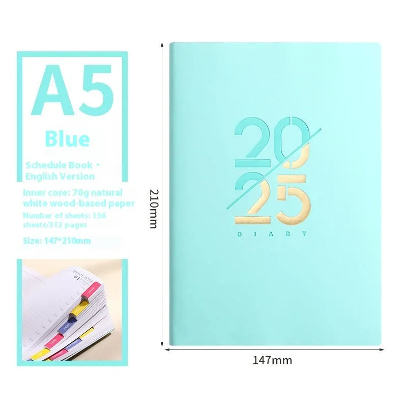 Soft cover A5 daily planner schedule book in blue, showing lay-flat binding and faux leather texture.