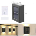 Small black solar garden wall light with LED illumination for outdoor decorative lighting