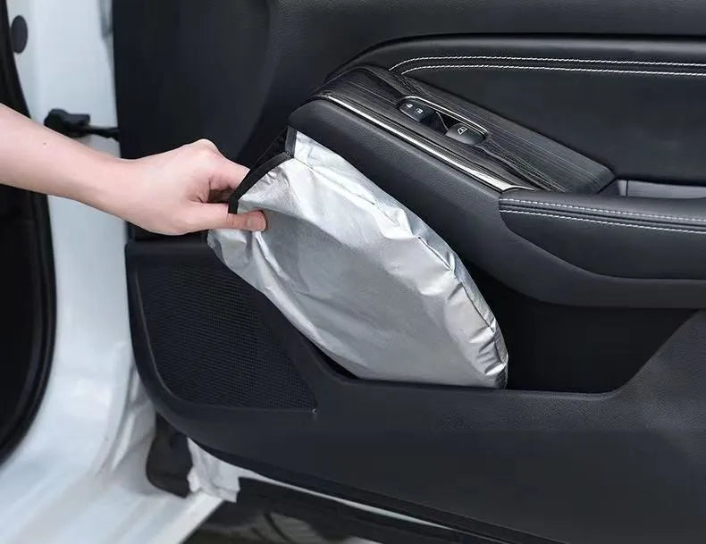 Titanium silver aluminium foil car sunshade folded to show size and reflective surface