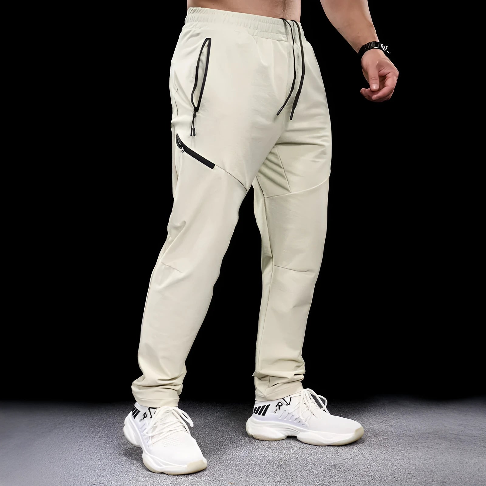 Men's black waterproof quick-drying workout pants with mid waist design for sports and fitness