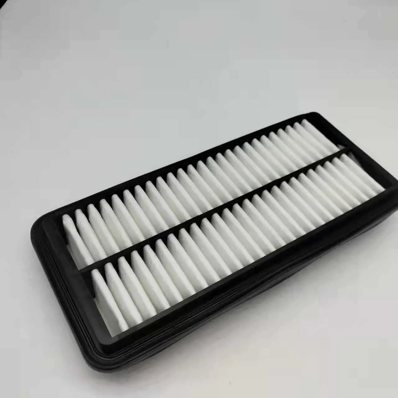 Black car air filter with 256x113x40mm dimensions for modern vehicles
