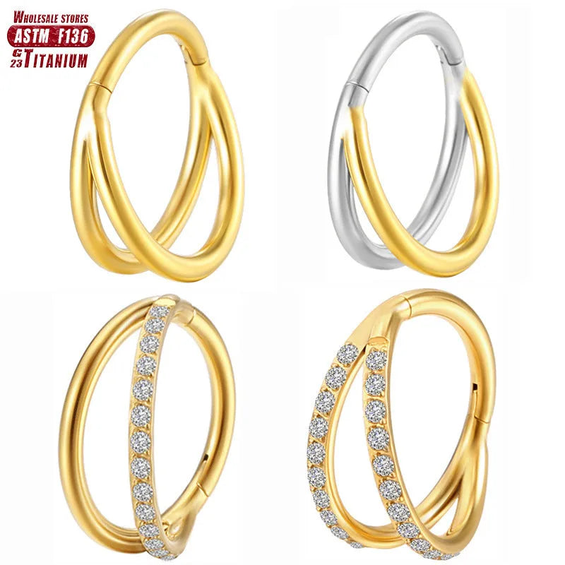 Titanium alloy nose ring jewellery on a plain background showing silver and gold colour options.
