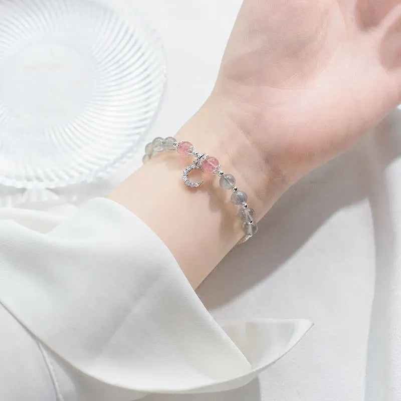 Natural moonstone bracelet with silver crescent moon charm and crystals on adjustable chain