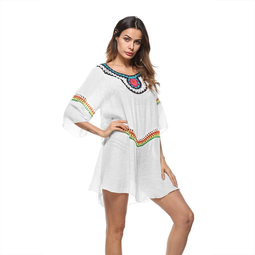 Crocheted ethnic style sun protection beach cover-up for women in apricot colour.