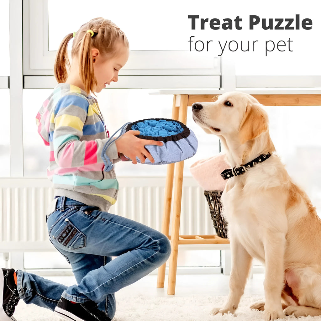 Blue adjustable dog snuffle mat with suction cups, used as a puzzle feeder for slow eating and mental stimulation.