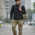 Tactical soft shell jacket in black colour for mountaineering and camping