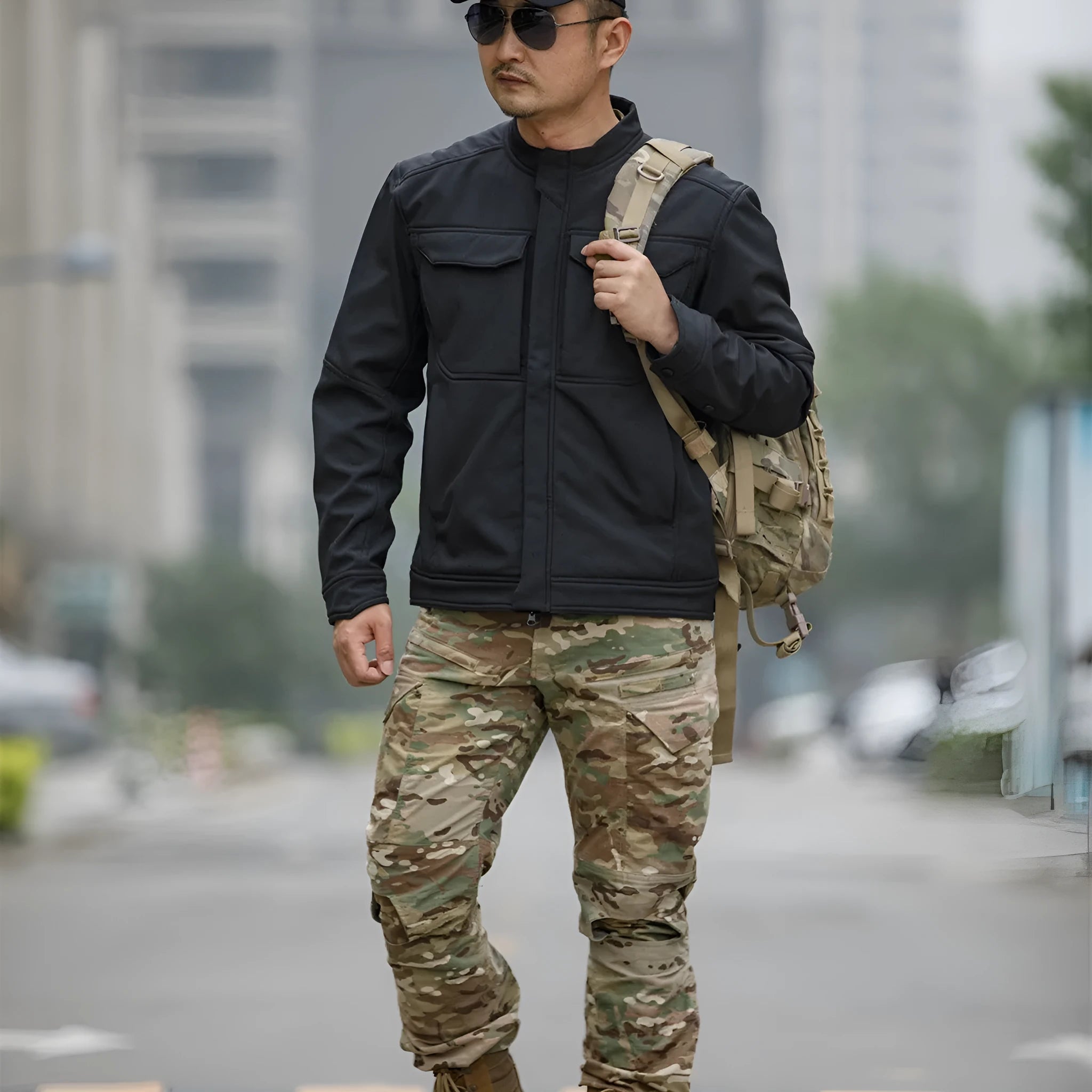 Tactical soft shell jacket in black colour for mountaineering and camping