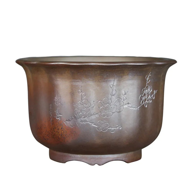 Indoor antique carved ceramic flower pot in purple sand with wood burning finish