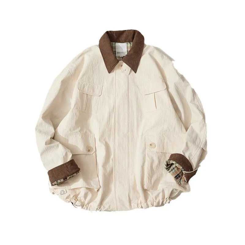Casual jacket with contrasting colour panels and side seam pockets in polyester material