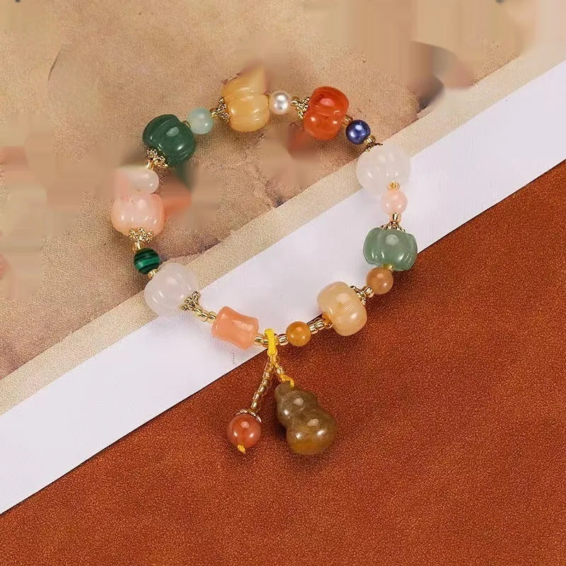 Carved pumpkin lotus Bodhi root bracelet with white jade beads and multiple dimensions