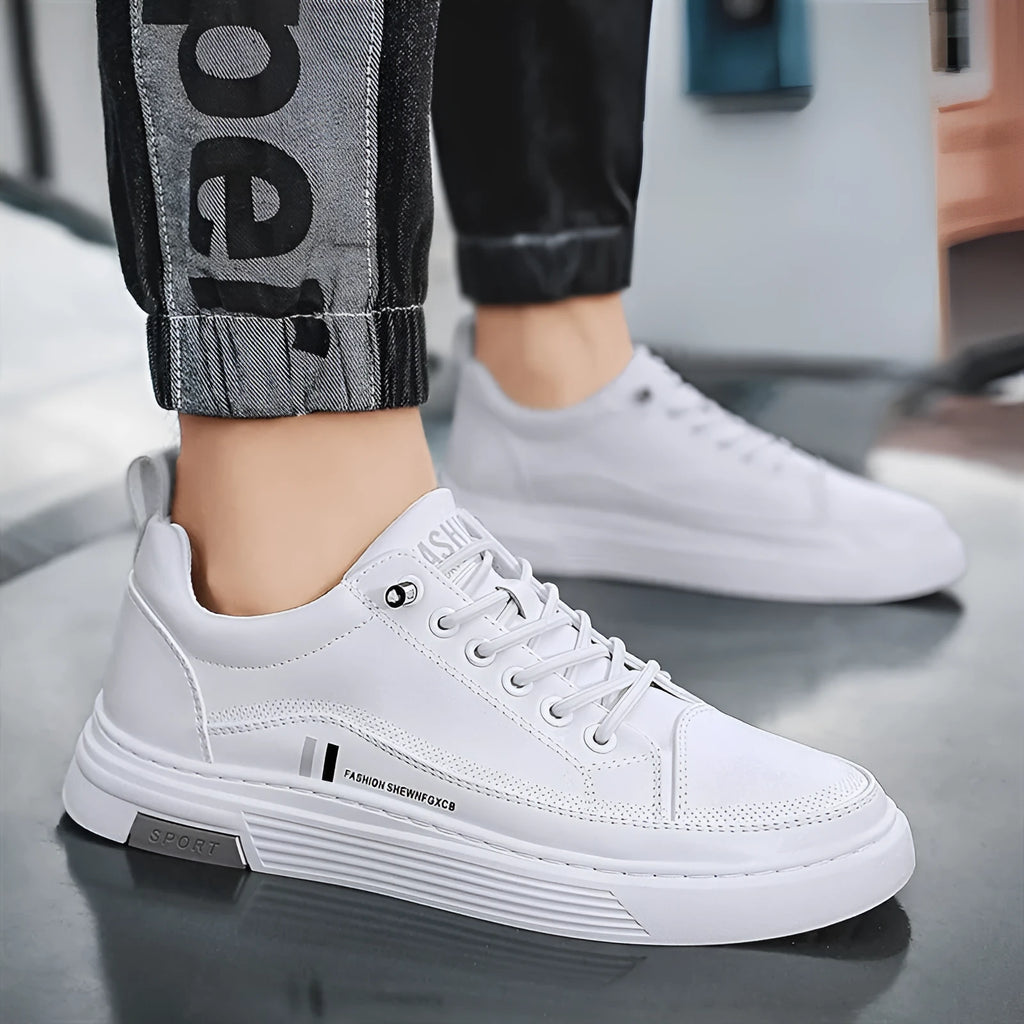 Men's low-top skateboard shoes with elastic band, microfiber upper, and rubber sole in black or white.