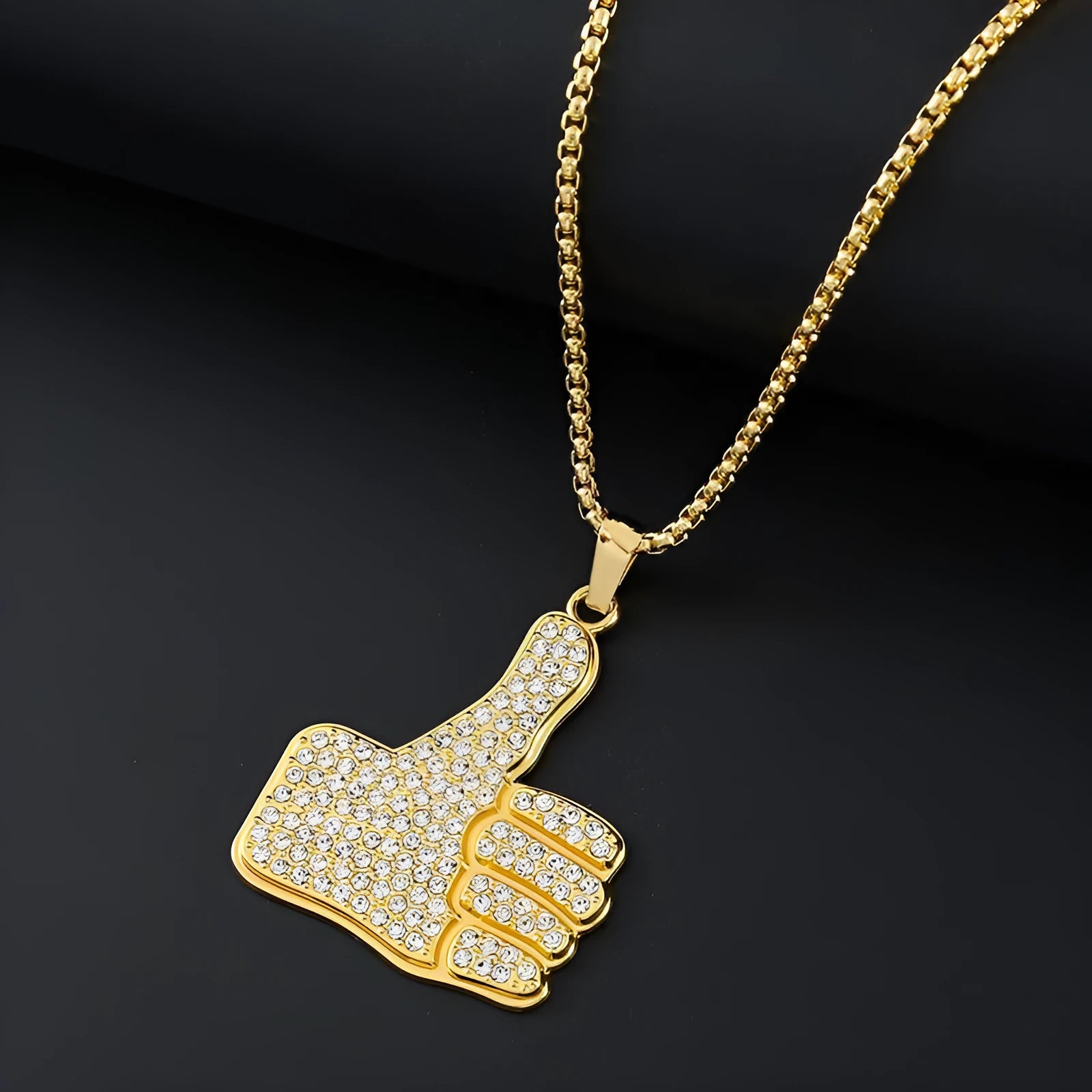 Gold geometric women's necklace with sparkling zircon stones on a model.