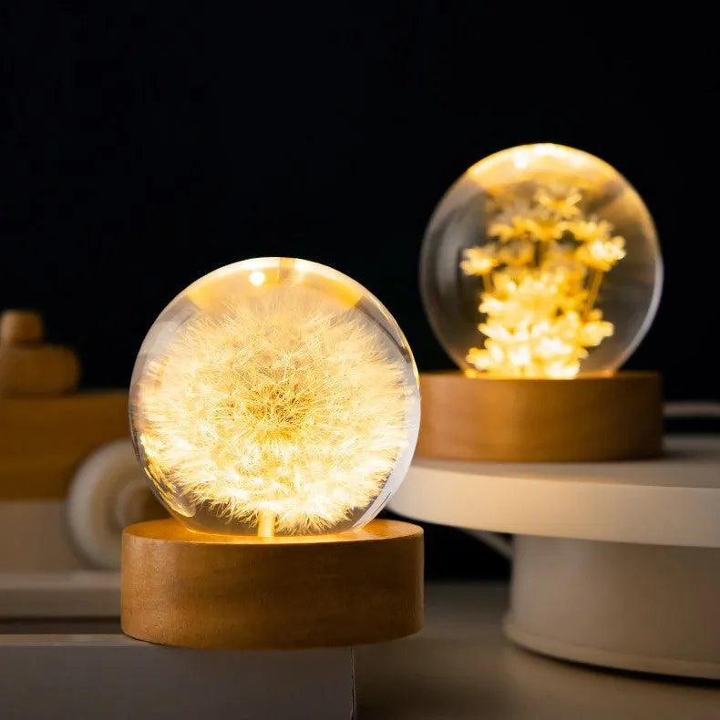 3D dandelion crystal ball night light on beech wood stand, showing 60mm resin sphere with internal flower.