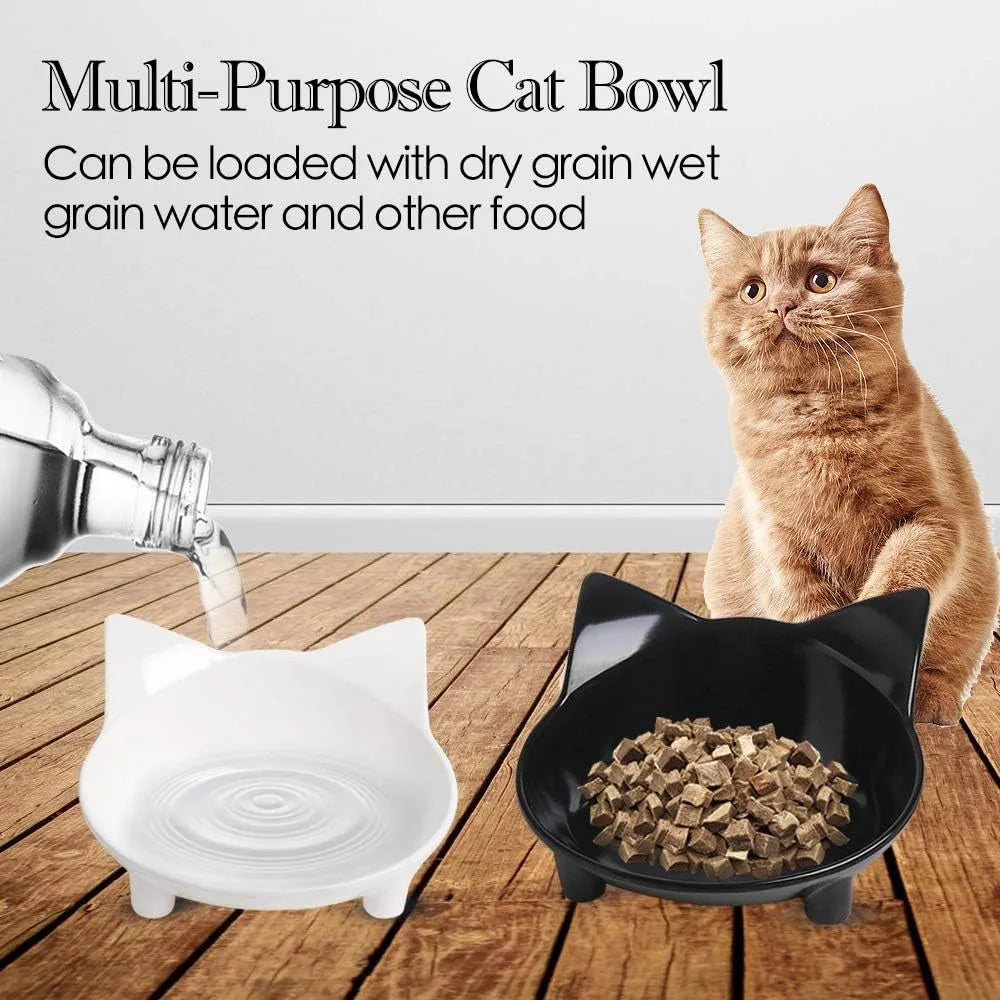 Black shallow melamine pet food bowl with non-slip rubber base on a wooden surface.