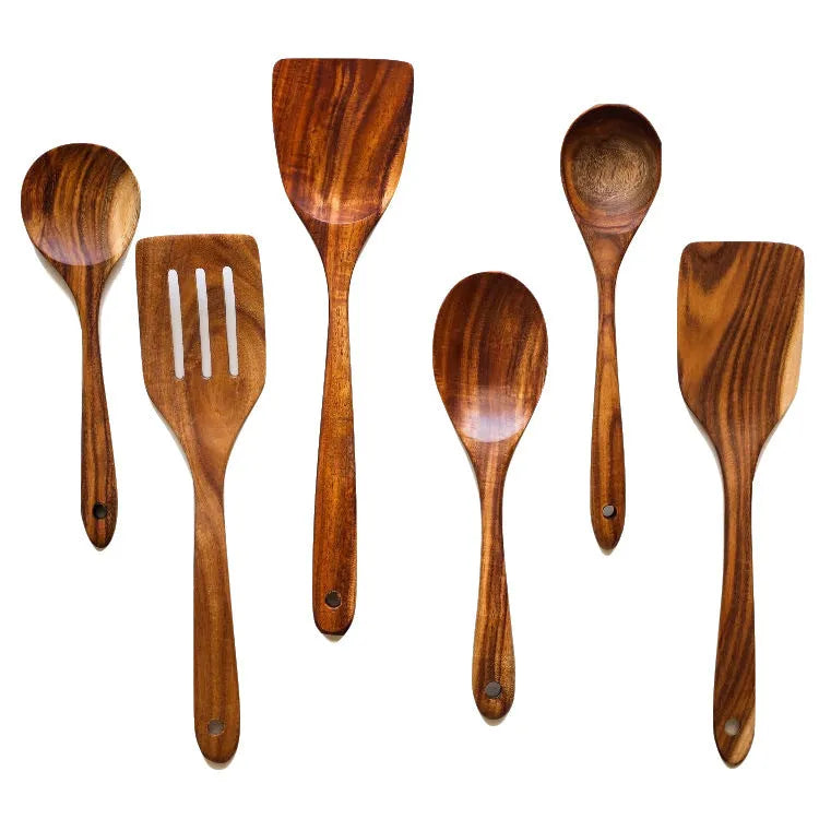 Set of seven wooden cooking utensils with spoon and shovel shapes for use with non-stick pans.