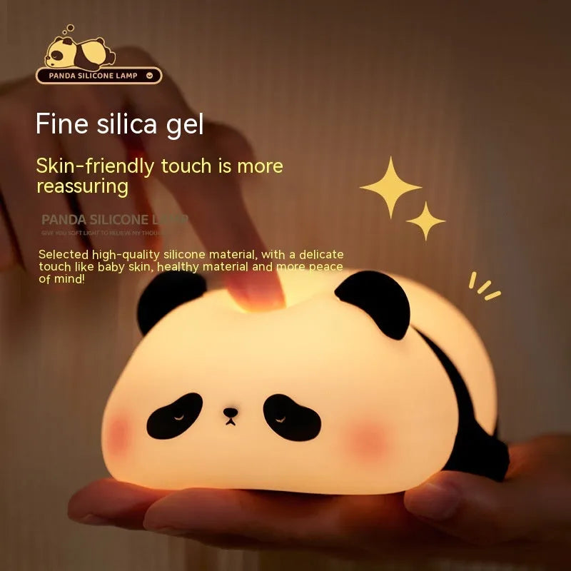 Cartoon panda night light with soft white glow on bedroom bedside table