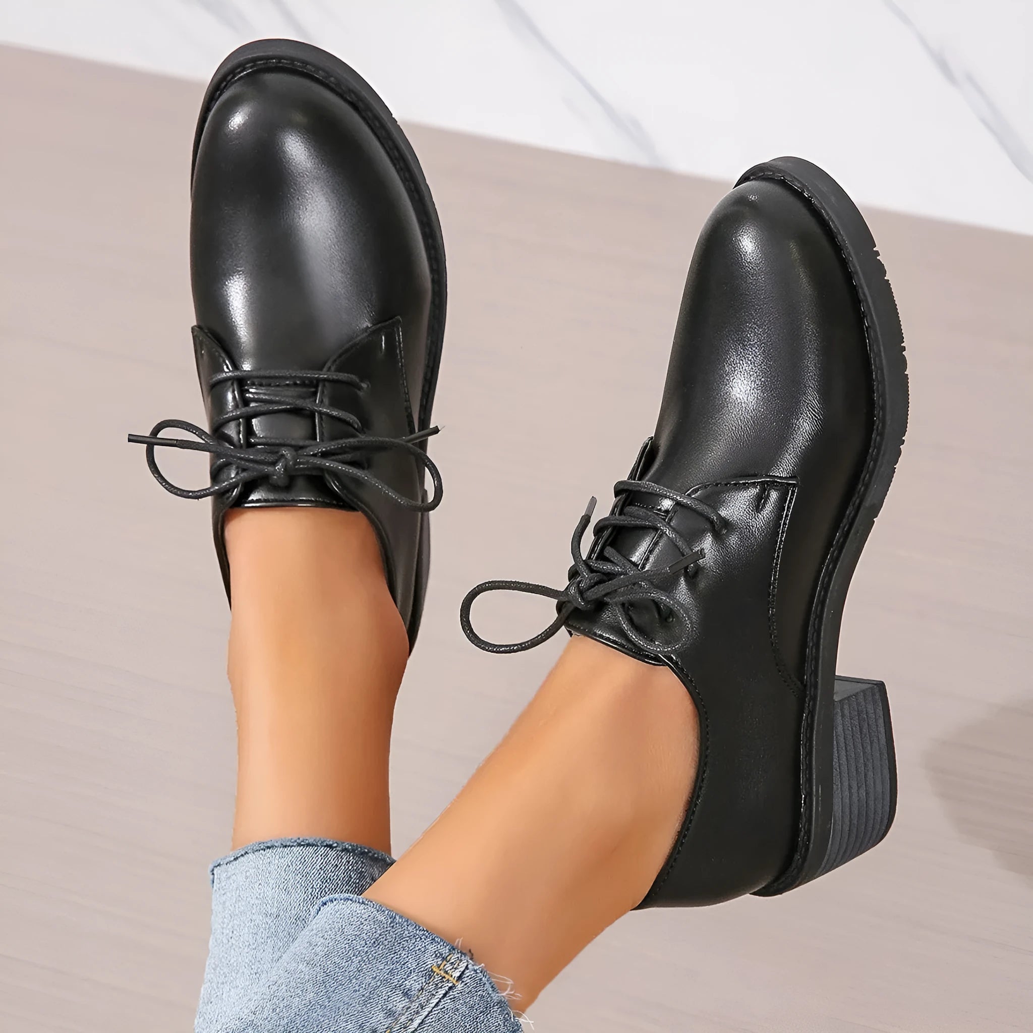 Black women's professional work shoes with thick chunky heel and low-top design